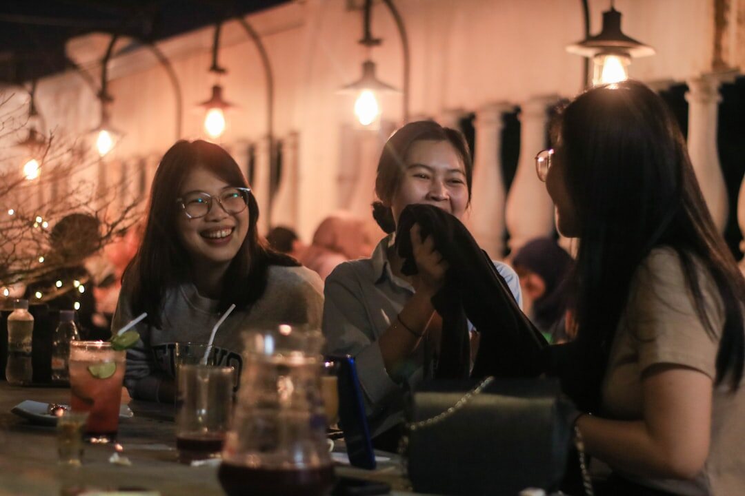 group of friends talking in cafe