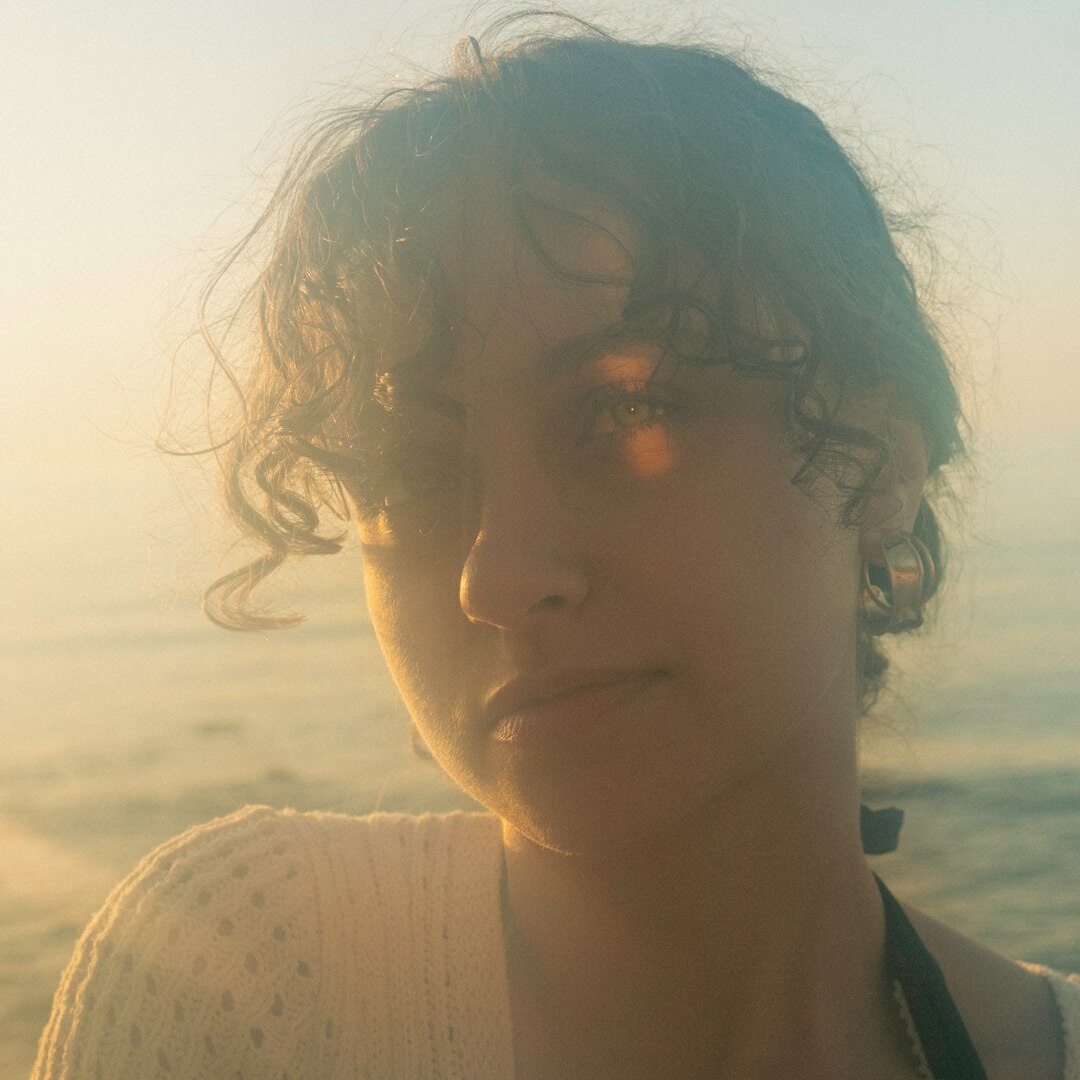 Portrait of a British woman with curly hair