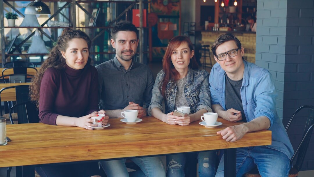 group of friends talking in cafe