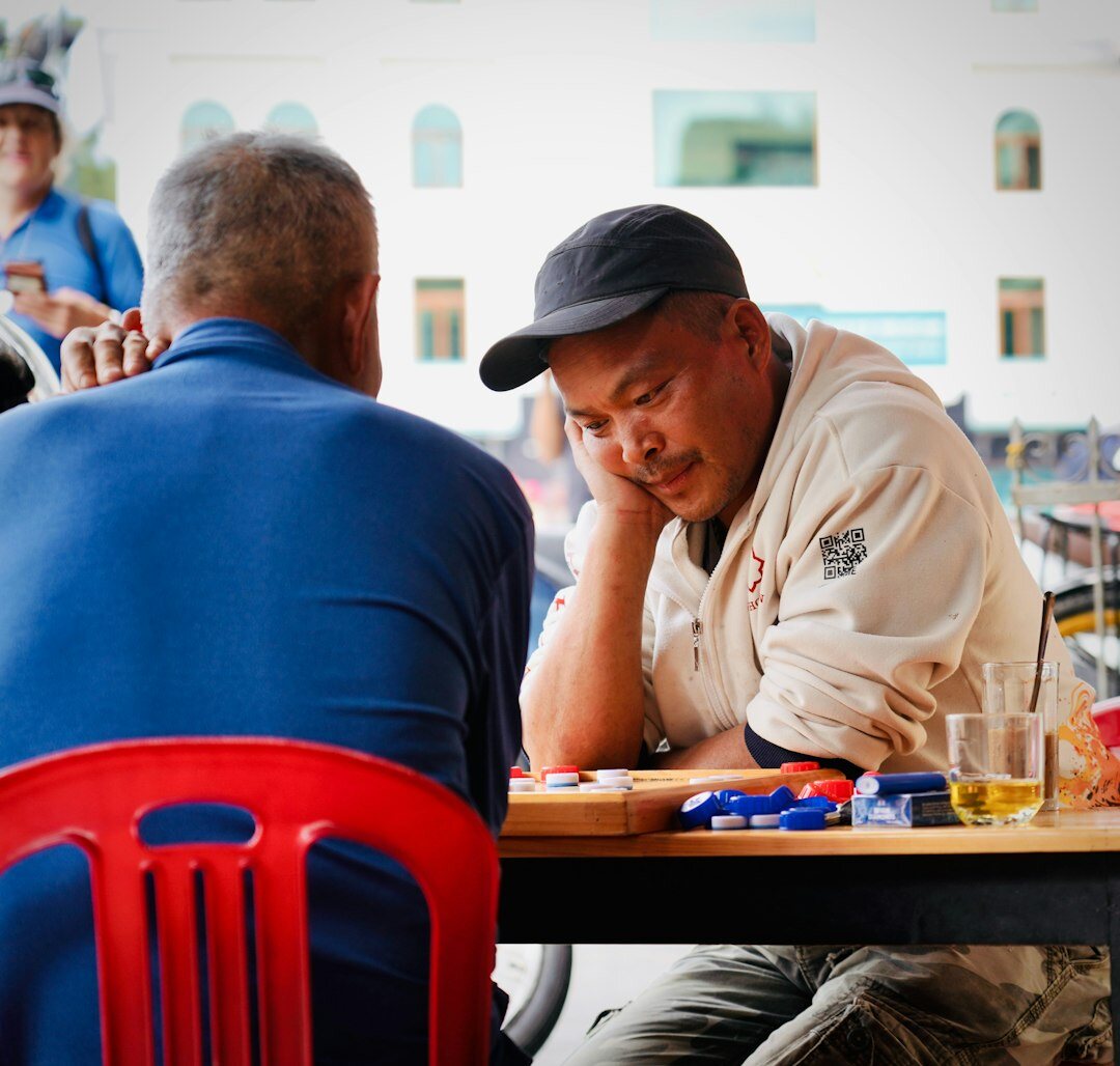 Small group of colleagues discussing around a table