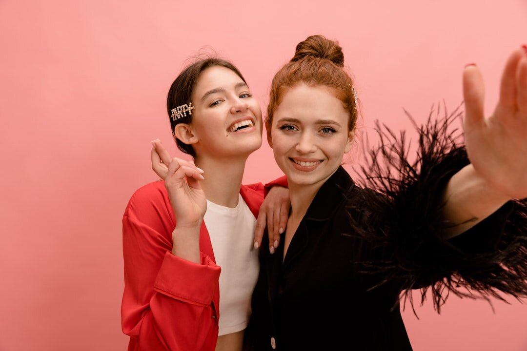 celebrity duo smiling